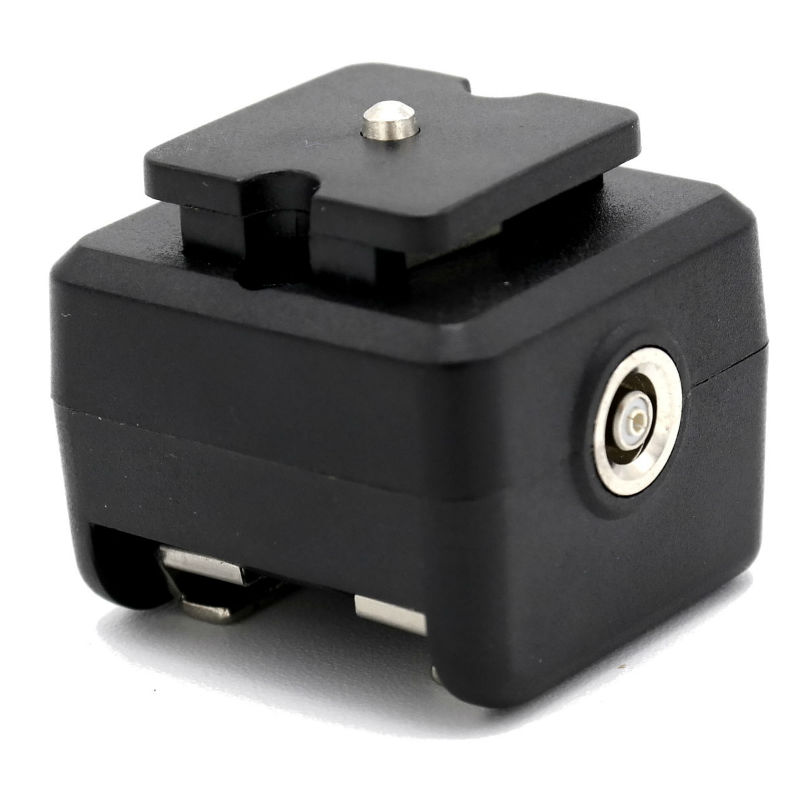 Adaptateur de griffe Caruba - (contact central vers contact X)