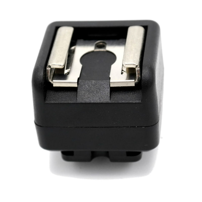Adaptateur de griffe Caruba - (contact central vers contact X)